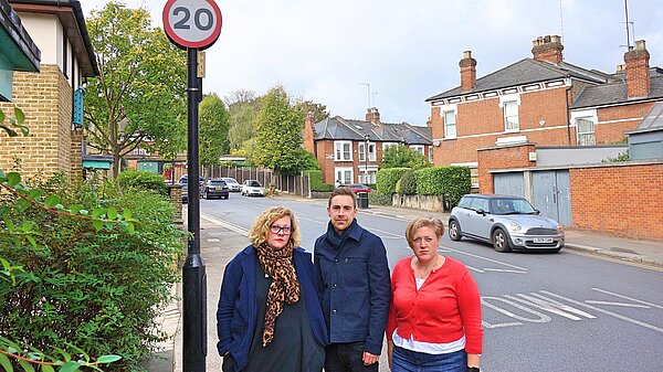 Photo of Lib Dem councillors on Wolseley Road by a 20mph road sign